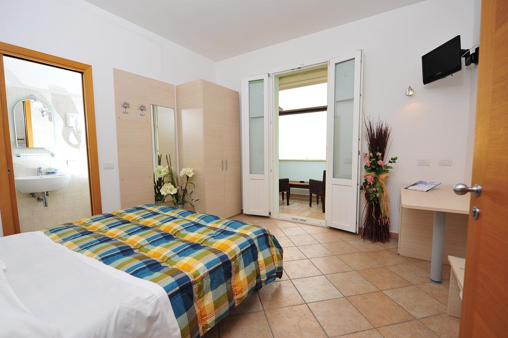 Hotel Aurora San Vincenzo Rum bild