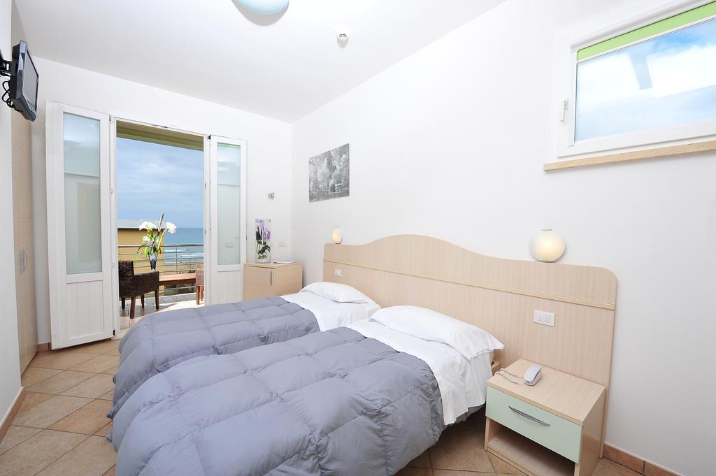 Hotel Aurora San Vincenzo Rum bild